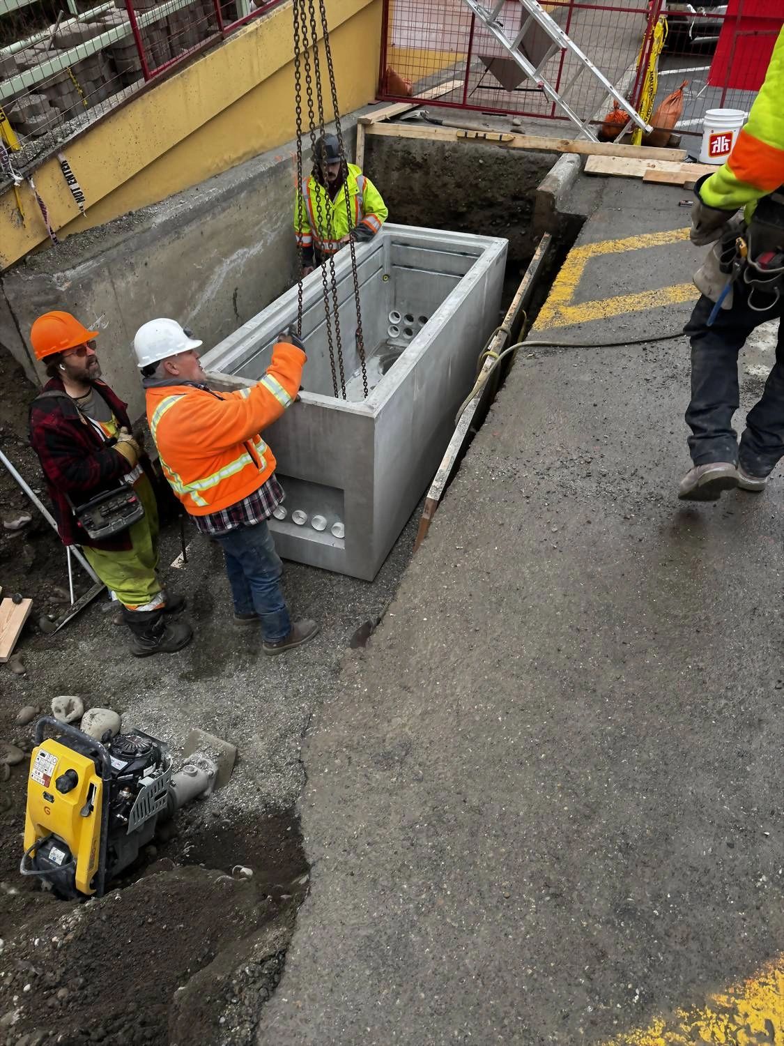 Precast utility vault setting on a downtown civil project
